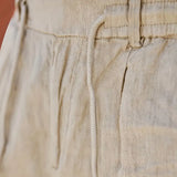 NICHOLS | PANTALONI LARGHI IN LINO CON CORDINO