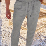 NICHOLS | PANTALONI LARGHI IN LINO CON CORDINO
