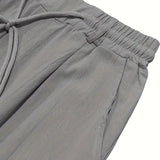 NICHOLS | PANTALONI LARGHI IN LINO CON CORDINO