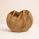 Lola | Borsa Tonda in Paglia Intrecciata con Motivo — Cognac