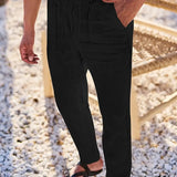 NICHOLS | PANTALONI LARGHI IN LINO CON CORDINO